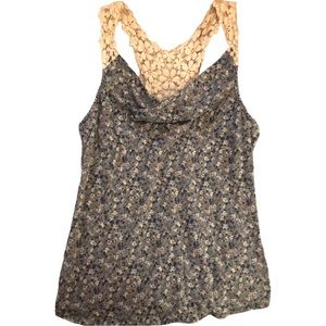 Womens floral halter back shirt with white flower design.